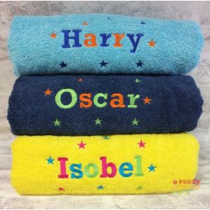 Rockwell font. Aqua Towel Harry - royal blue, orange. Navy Towel Oscar - lime green, orange. Yellow Towel Isobel - hot pink, turquoise, lime green.